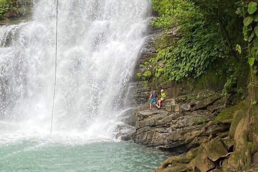 Two kids exploring and deciding to jump off from there. 