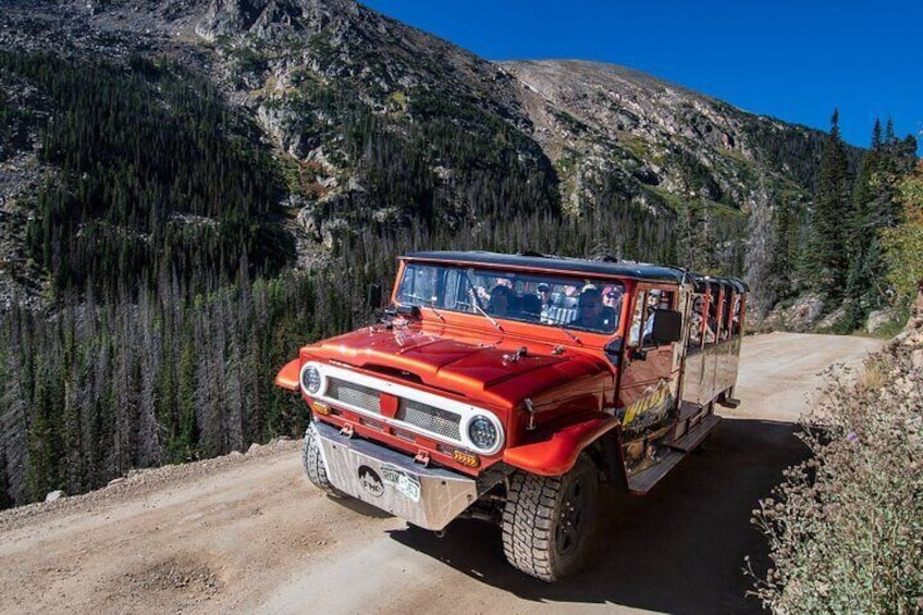 Custom tour truck able to be fully enclosed with clear tops to keep the views unobstructed but the cold at bay