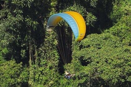 Paragliding and River Tubing private experience from Guatape