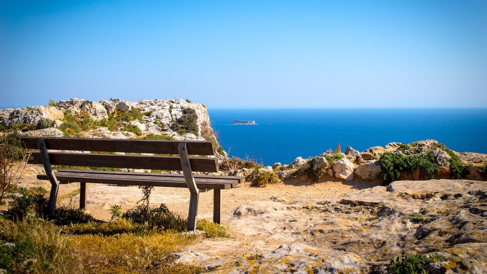 A bench looking out at the coast of Malta