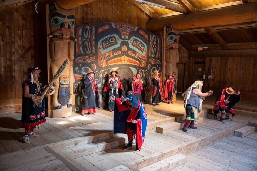 Guided tour of Saxman Native Village with multiple components including a dance performance by the Cape Fox Tours Dancers.