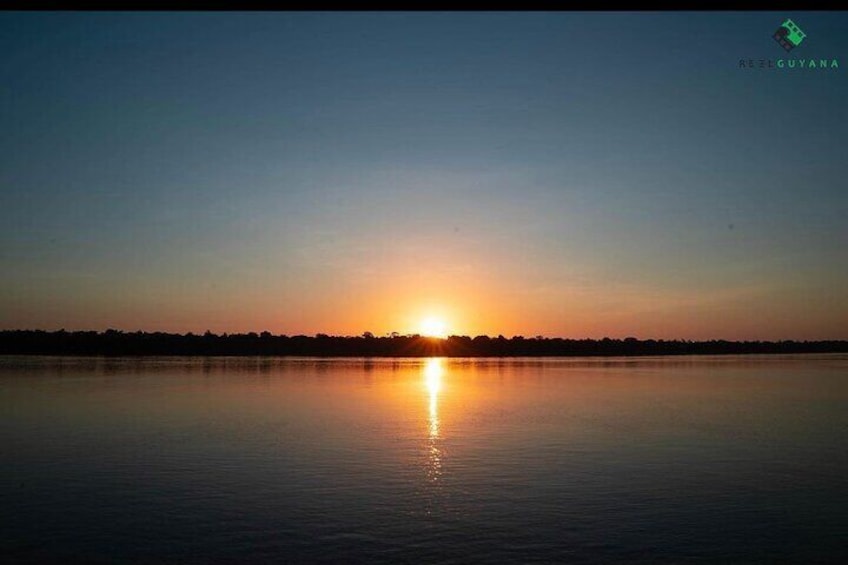 Have your picture taken with the sun dropping behind you