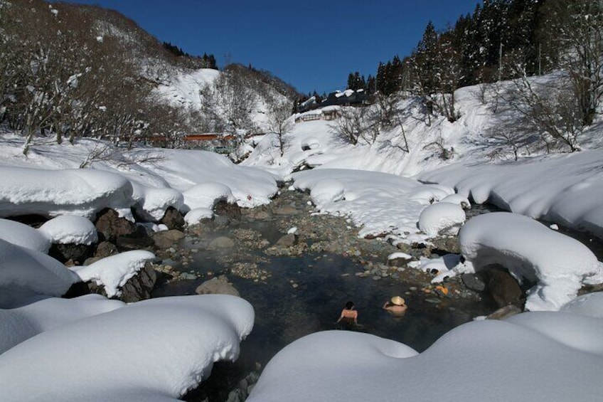 Natural hot spring in the river