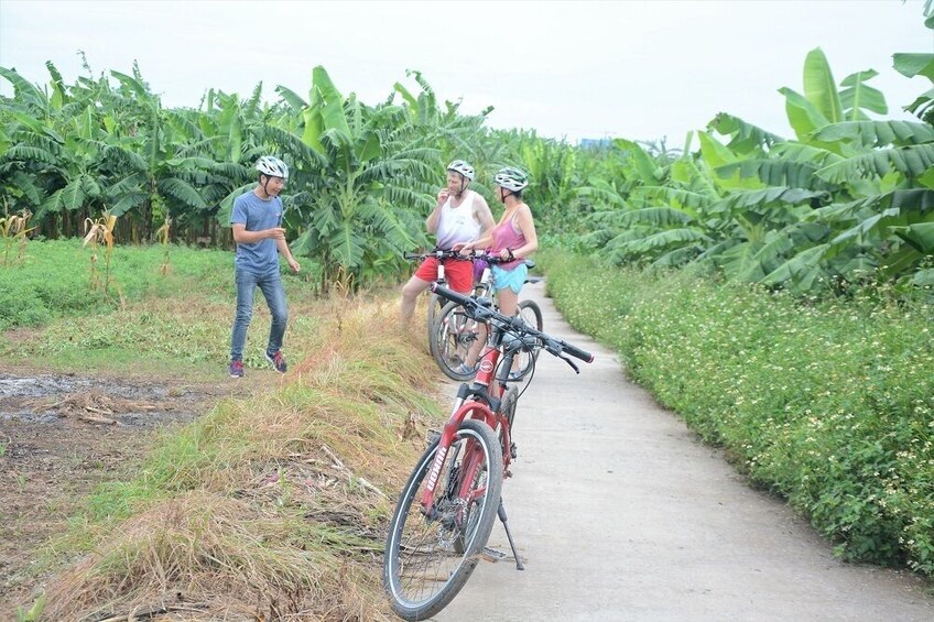 Enchanting Hanoi Bicycle Sunset Tour: Historic Bridges & Local Life