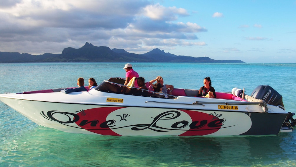 Tour speedboat float on clear waters in Mauritius