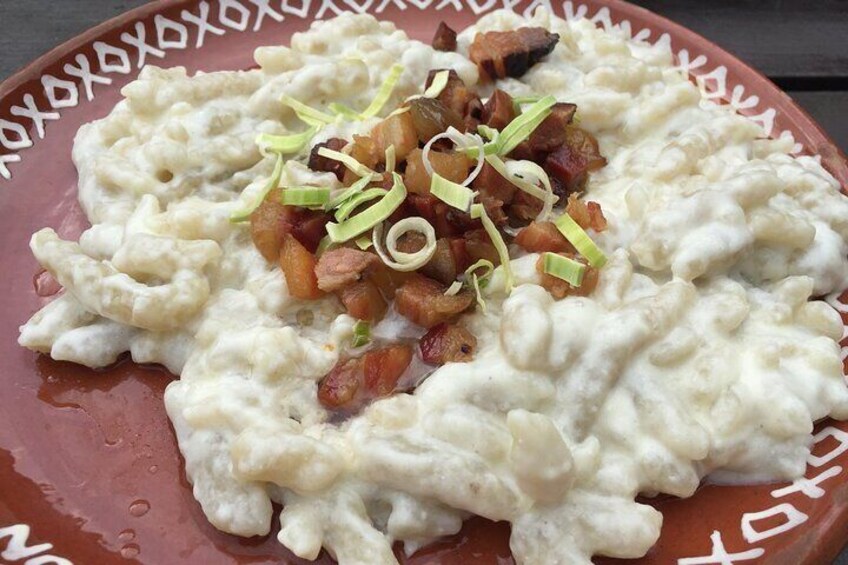 Slovak most traditional dish, - Bryndzove halusky - potato dumplings with melted sheep cheese and bacon. Tasty and genuine Slovak