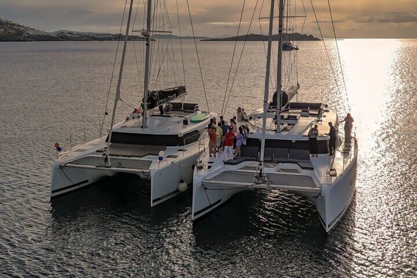 Semi-Private Brand-New Catamaran Cruise in Mykonos with Meal, Drinks & Transport