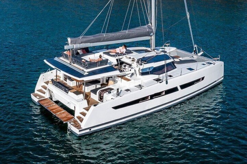 Semi-Private Brand-New Catamaran Cruise in Mykonos with Meal, Drinks & Transport