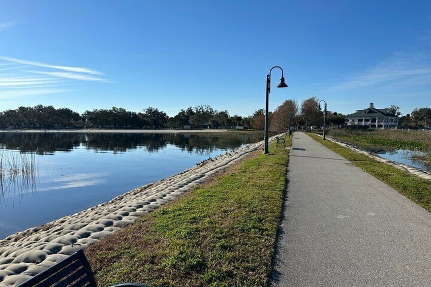 Cruising along the St. Cloud lakefront on the multi-use trail. A view from the pavilion in the middle of the lake.