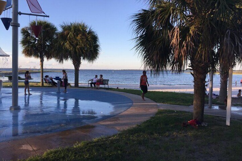 Free splash pad next to the sandy beach at St. Cloud Lakefront Park.