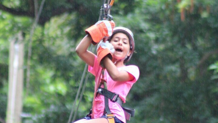 Child enjoying her Zipline at the Harrison's Cave Eco-Adventure Park