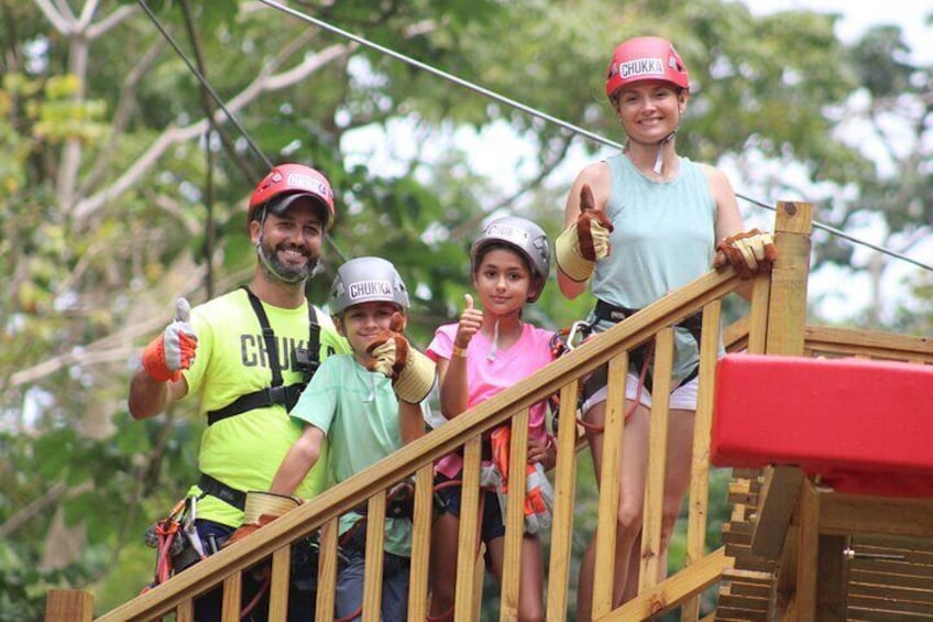 Family after they completed the Monkey Zipline Adventure and Challenge Course at the Harrison's Cave Eco-Adventure Park 