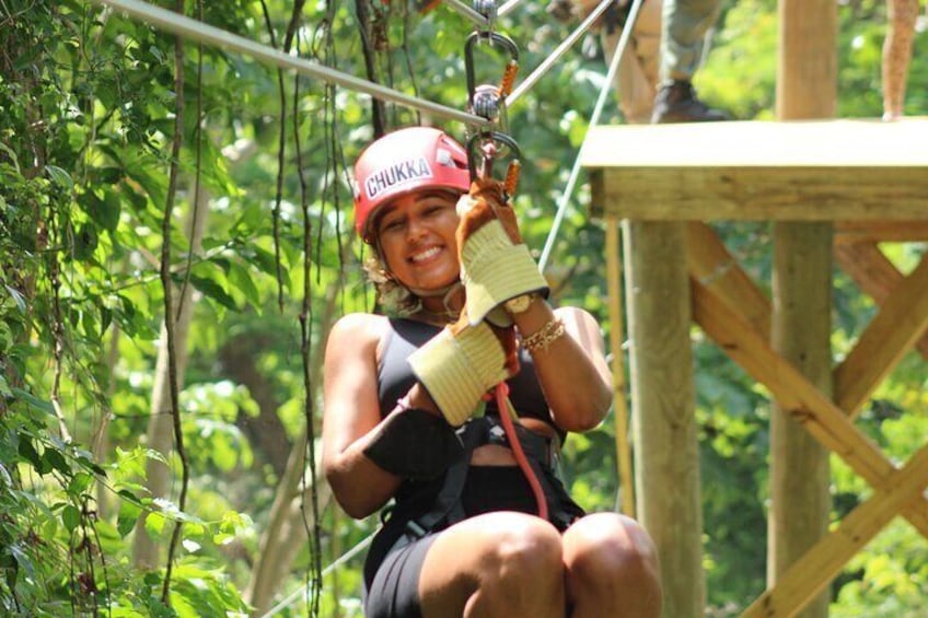 Guest enjoying the Zipline on the Monkey Zipline Adventure at Harrison's Cave Eco-Adventure Park