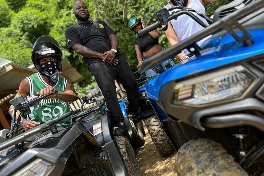 ATVS riding through hills and valley.