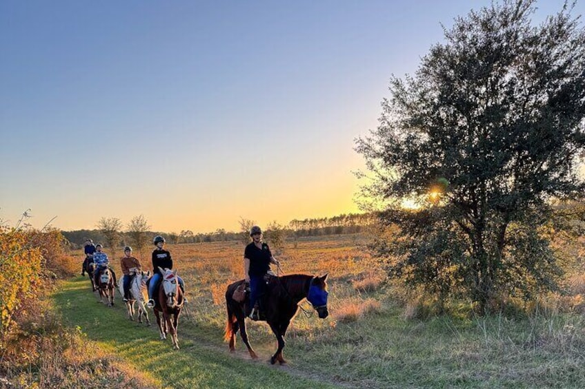 Sunset riders headed toward champagne and s'mores!