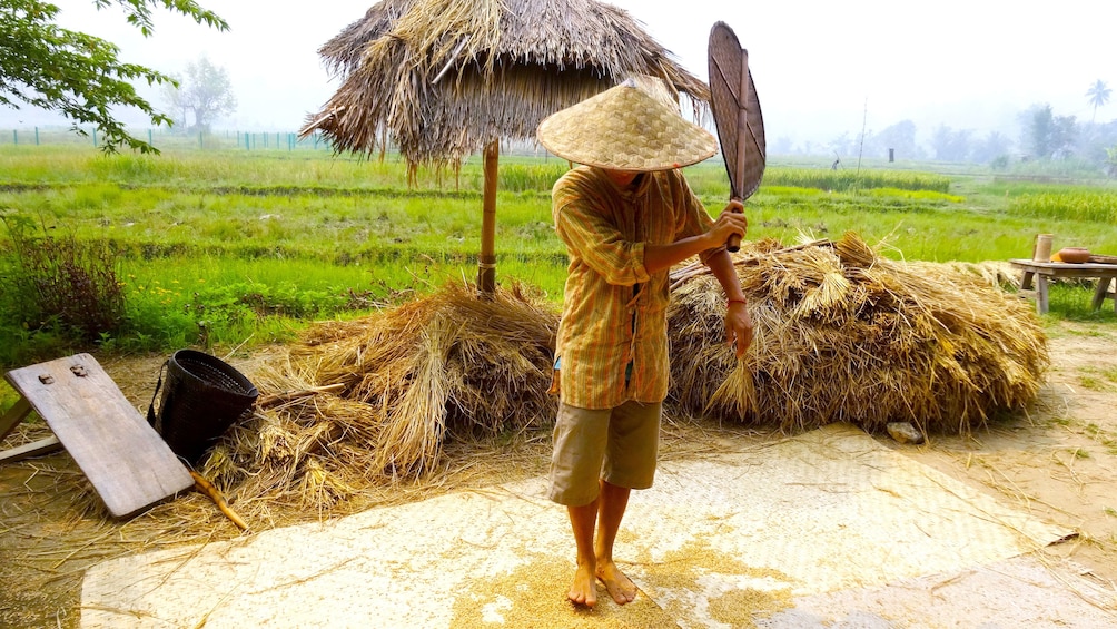 Man working on cultivation process in Laos