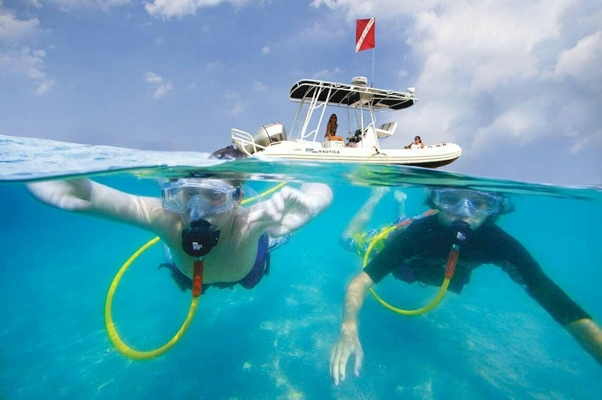 Parasailing & Snorkeling Catamaran Cruise with Natural Pool