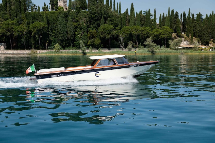 Picture 1 for Activity Lake Garda: Private Sunset Cruise to Isola del Garda