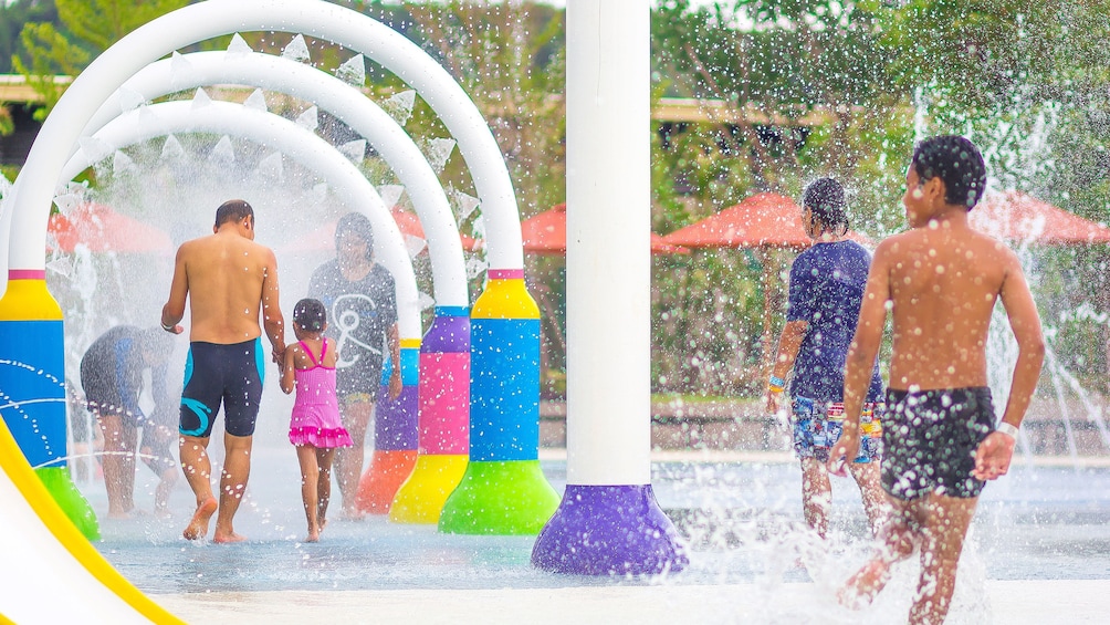 Children playing in water at Ramayana Water Park in Bangkok