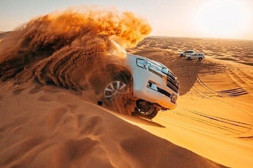 Private Morning Dubai Desert Safari in 4x4 vehicle & Camel Ride