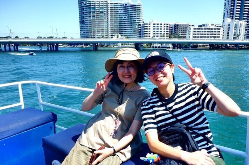 Customers on sightseeing cruise