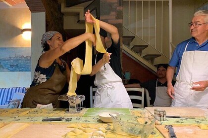 Traditional pasta rolling in an ancient Tuscan home