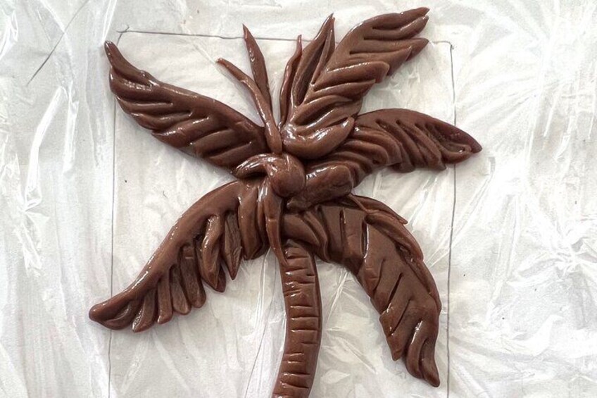 Students will learn how to use modeling chocolate to construct a palm tree design