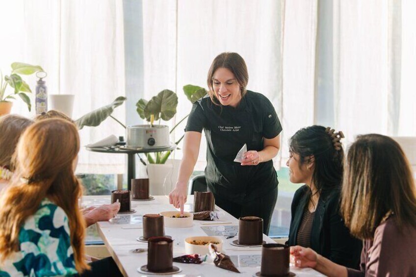 The class is led by a professional chocolate artist