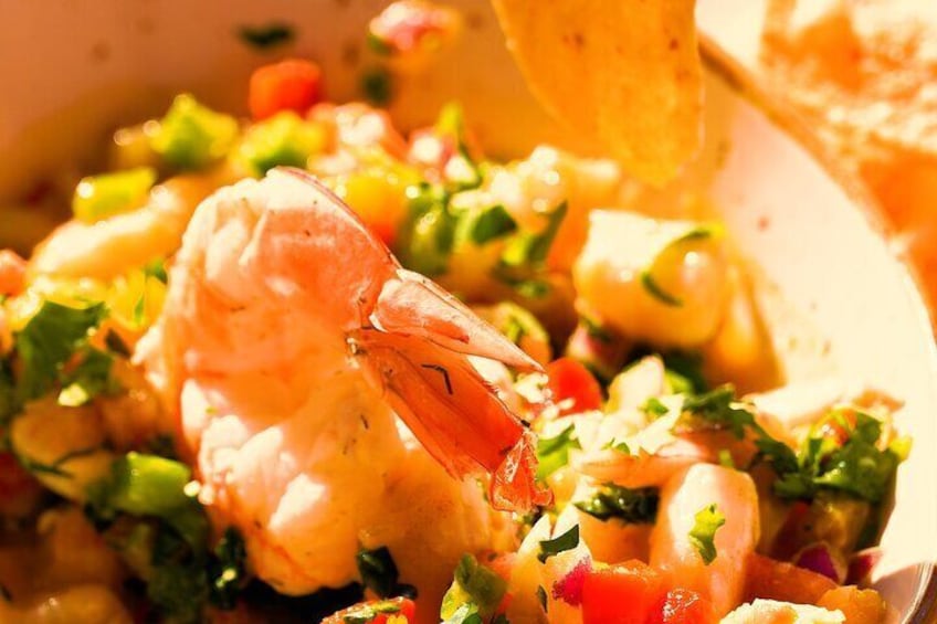 Indulge in The Fish Market's mouth-watering Peruvian Shrimp ceviche, a delicious symphony of flavors with every bite.