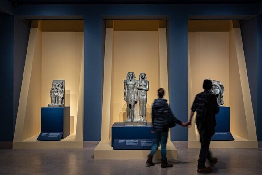 Visitors in Gallery 113, Masterpieces of Egyptian Sculpture from the Pyramid Age, at the 
Museum of Fine Arts, Boston.
