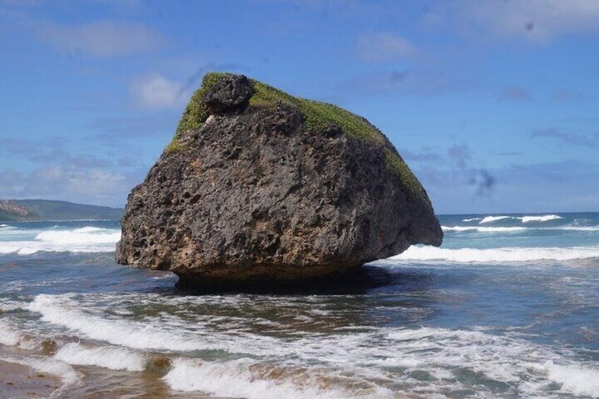 Giant boulder in the Ocen at Basheba a surfers paradise