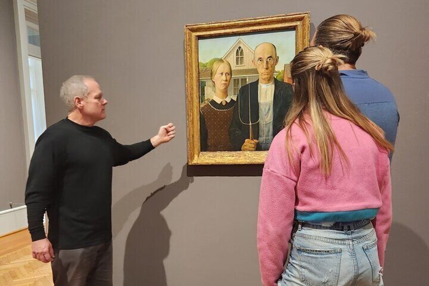Guide discussing American Gothic by Grant Wood