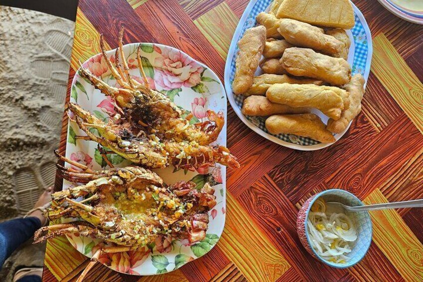 Garlic Butter Lobster, Festival and fried Bammy, with a spicy escovitch sauce