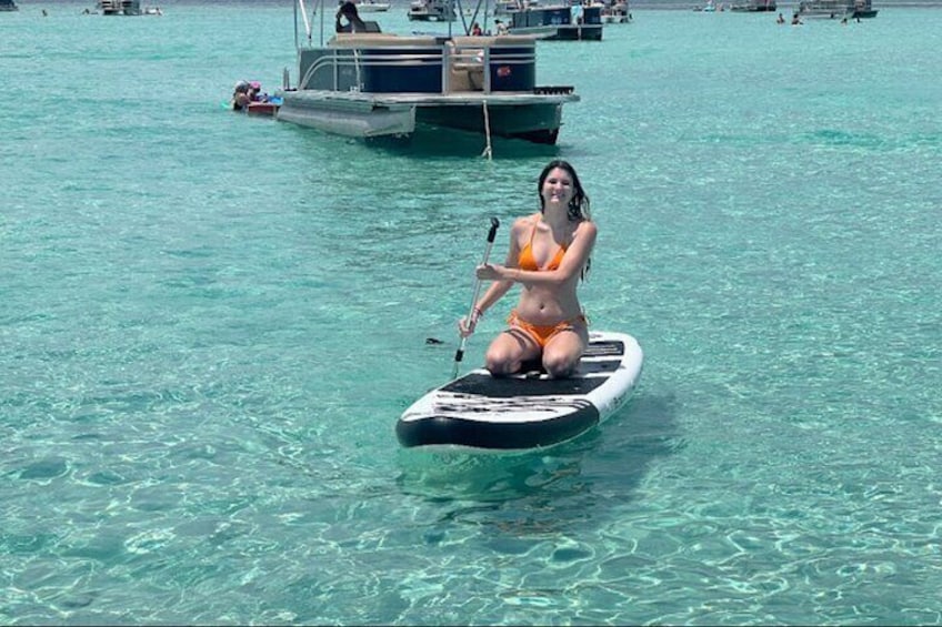 Ride our paddle board.