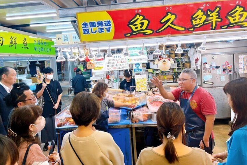 We will tour the fish shop at the public market where we purchase fresh fish for making sushi ①