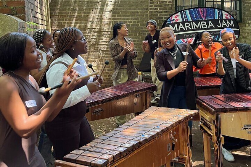 Learning to play the African Marimba 