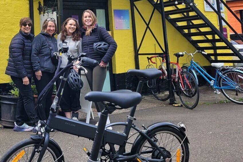 Glasgow Private E-bike Tour guest checking out the Hidden Lane in Glasgow