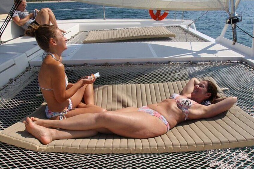 Full day Catamaran cruise in Porto Conte Natural Park