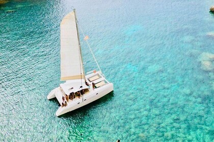 Full day Catamaran cruise in Porto Conte Natural Park