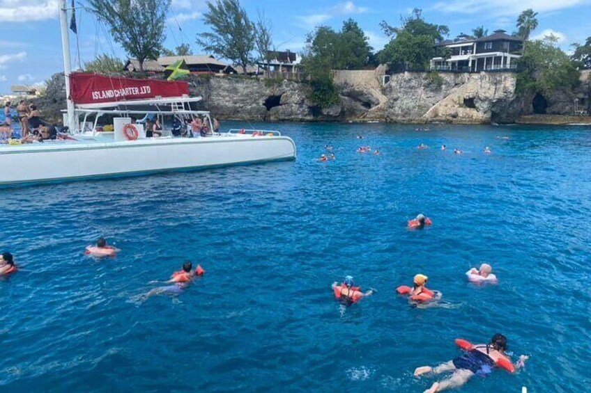 Rastasafari and Catamaran Cruise Tour From Negril