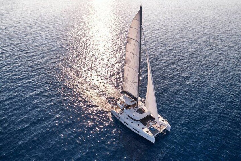 Catamaran Cruise to Dia Island with Meal and Water Activities