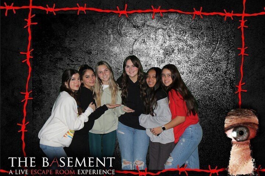 Souvenir group photo from THE BASEMENT: A Live Escape Room Experience in Las Vegas, NV