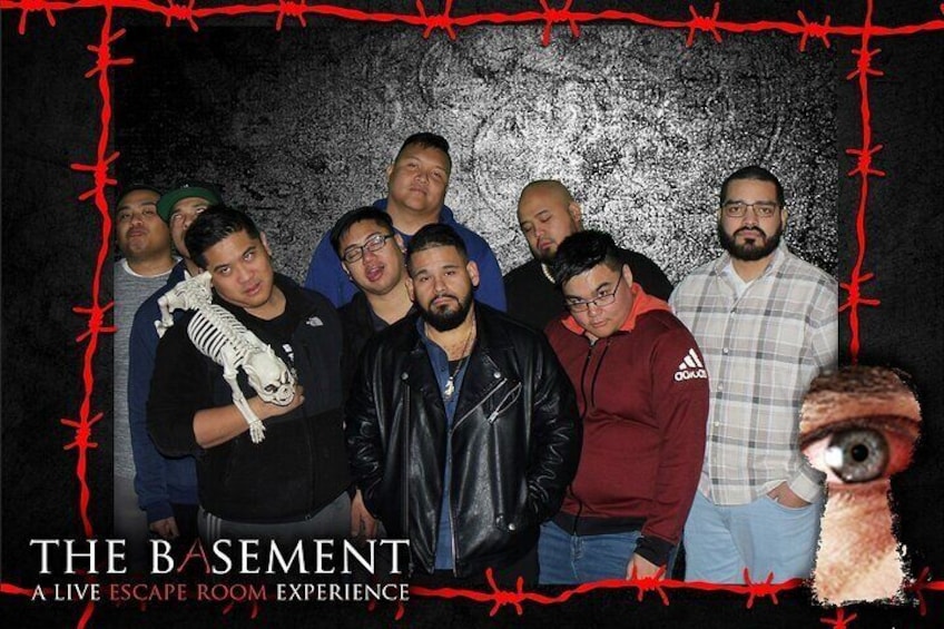 Group souvenir photo at THE BASEMENT: A Live Escape Room Experience in Las Vegas, NV