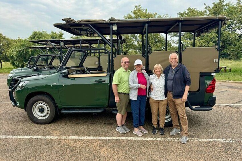 Happy tourists on safari