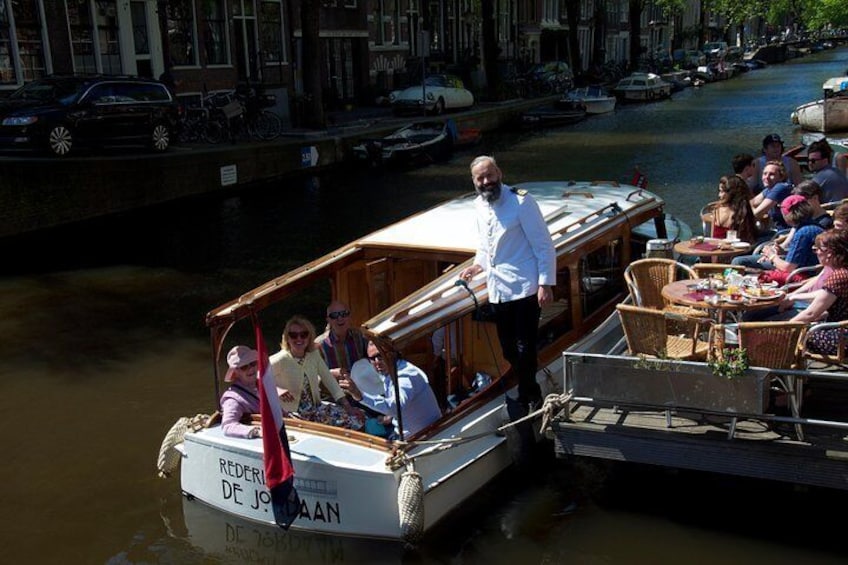 Private Guided Historic Amsterdam Canal Cruise in a Salon Boat