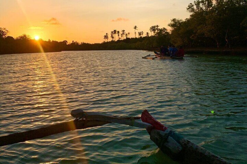 Sunset with other Canoes