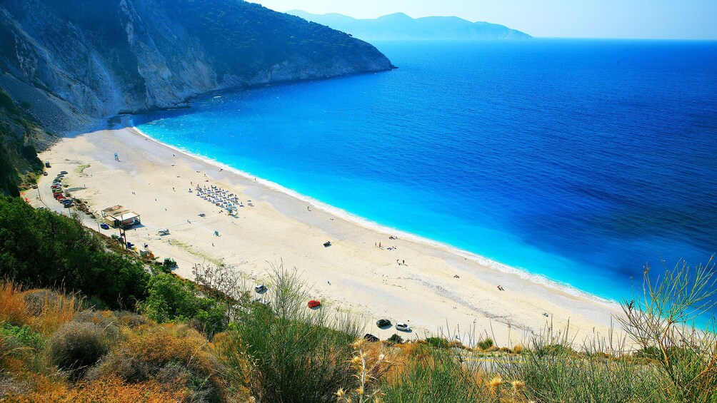 People on Myrtos Beach on Ionian Islands