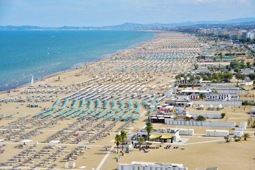 Picture 2 for Activity Rimini: Papaya Beach with Sunbed, Umbrella, Drink and Music