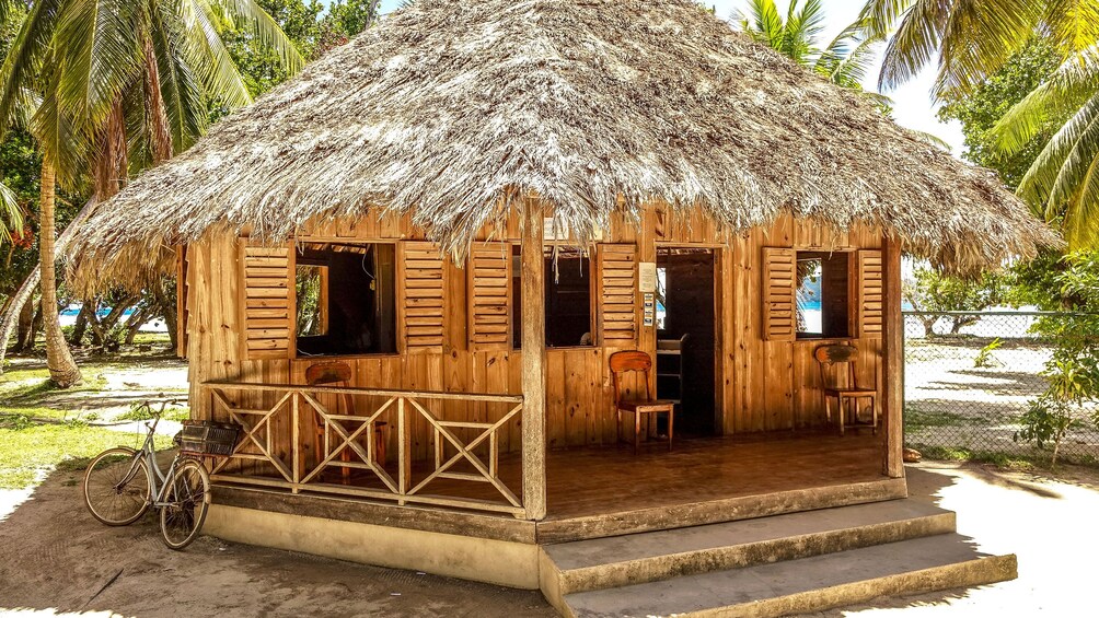 Would hut on beach in La Digue