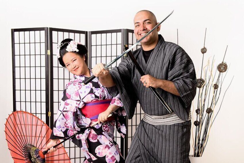 Photographed in a studio wearing a kimono